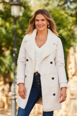 Ecru Luxe Faux Shearling Double Breasted Coat -Winter Fashion Shop web 2309 08 a23op004eu0001 a23tk183nl0001 a21bd004in0007 08 302